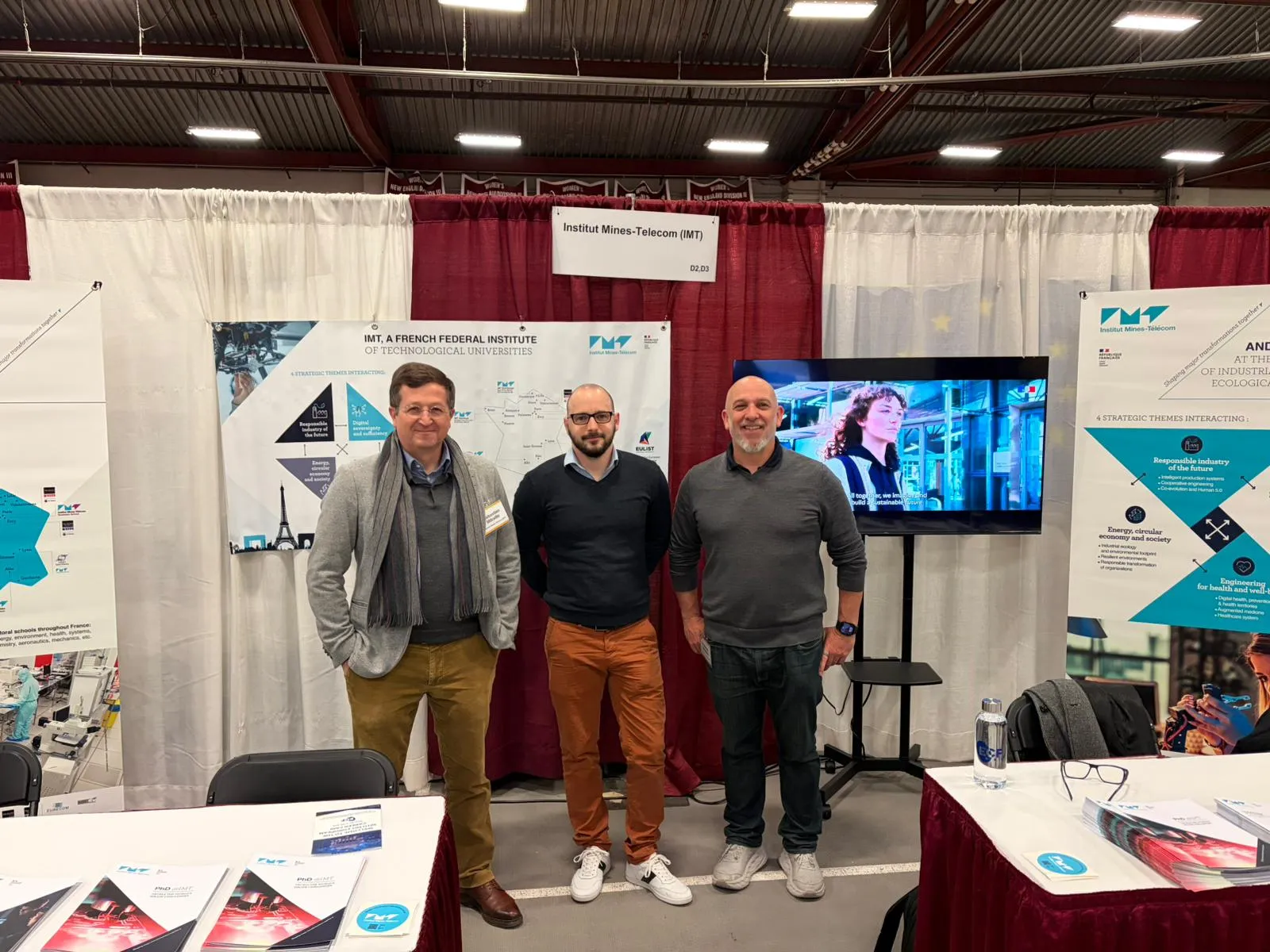Photos of our three representatives at the MIT European Career Fair 2026